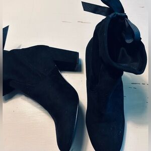 Black “suede” boots tie in the back! Unique and look GREAT on!